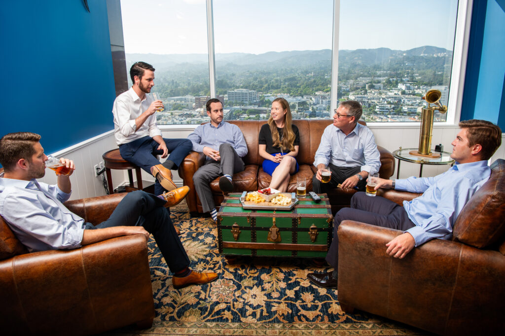 Social hour at an business firm office overlooking the Hollywood Hills in Los Angeles, Calif.