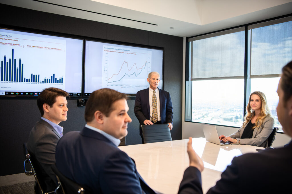 Banking executives working together in an office boardroom in Los Angeles, California.