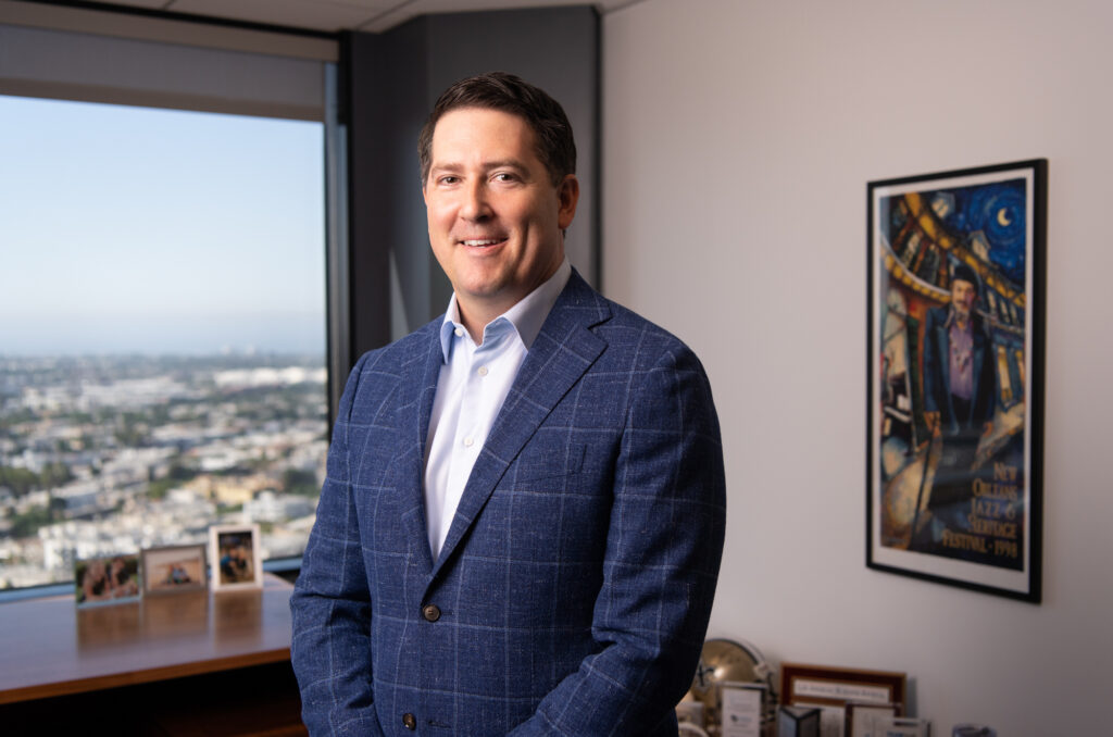 A business banking executive environmental portrait in an office overlooking the Pacific Ocean and Santa Monica, Calif.