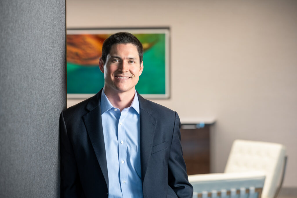 Banking executive environmental portrait in corporate lobby in Los Angeles.