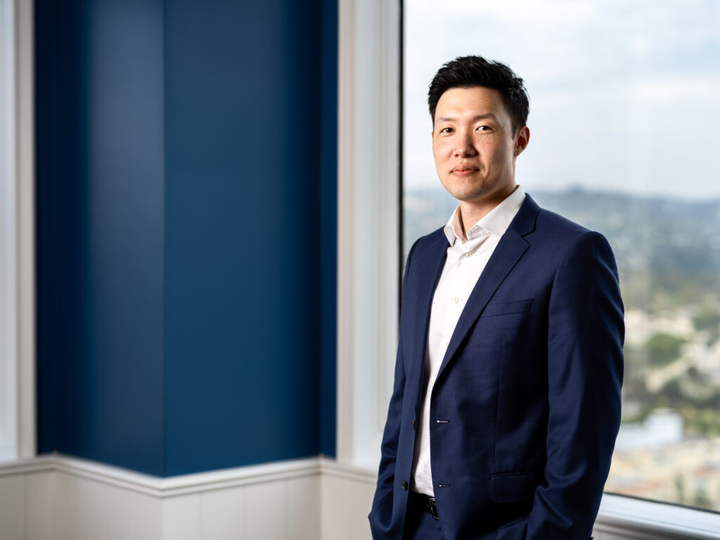 Environmental portrait of investment banker in Los Angeles office.